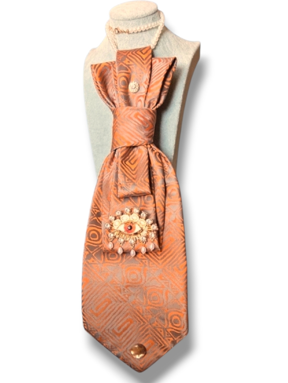3/$60 Geometric Patterned Orange and Gray Folded Cravat with Eye Accent  Gem Pin